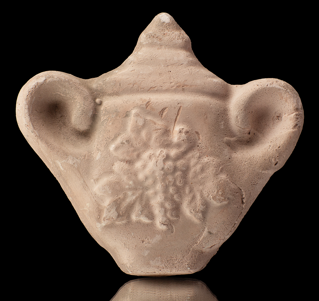 Cabeza de yeso con decoración floral