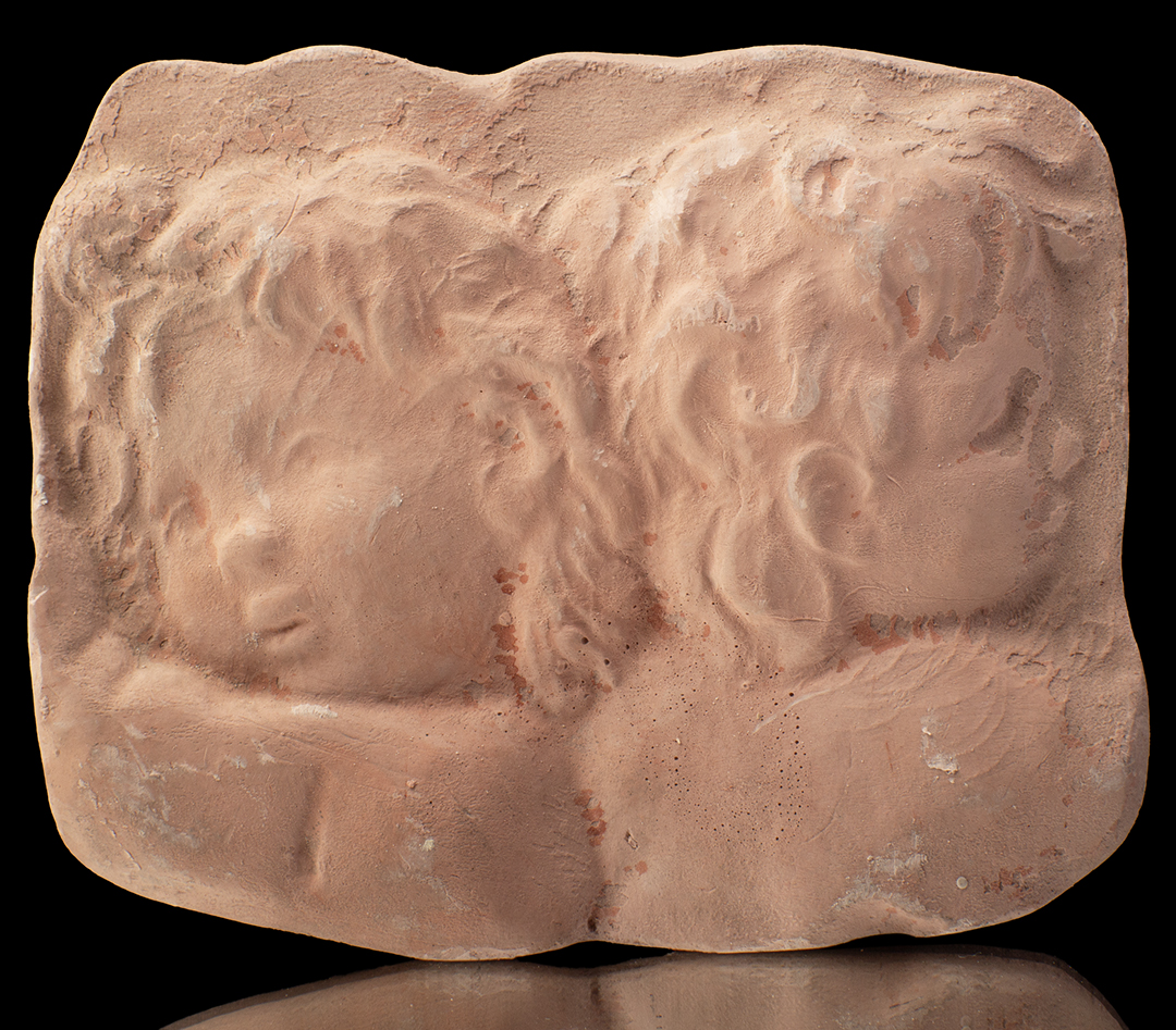 Placa de yeso con formas de �ngeles